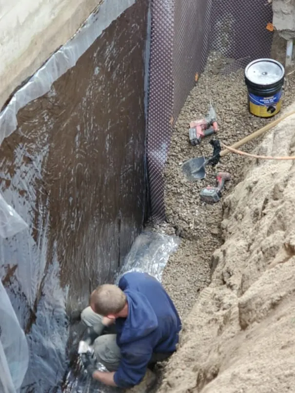 Waterproofing membrane application on Barrie building foundation