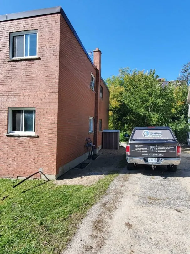 Final stages of exterior basement waterproofing in Barrie