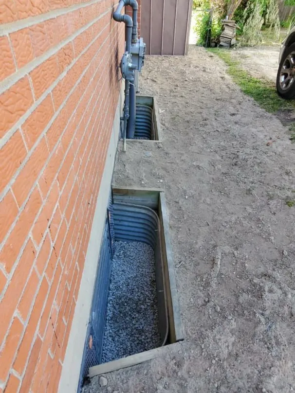 Foundation wall preparation for waterproofing membrane in Barrie