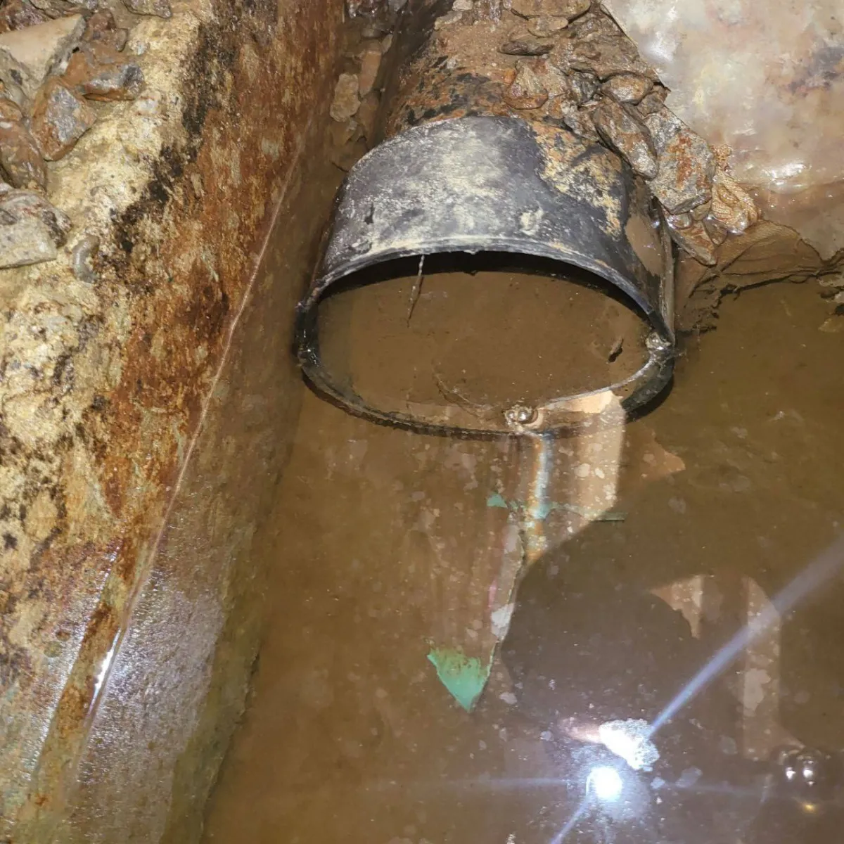 Foundation wall preparation and membrane installation at Mount Albert home